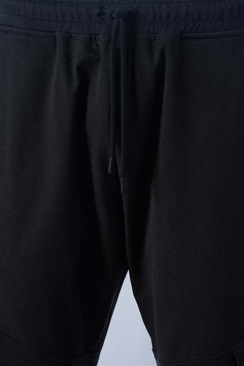Card slide image -  JOGGER DE MOVIES NEGRO CON BOLSILLOS PARA HOMBRE